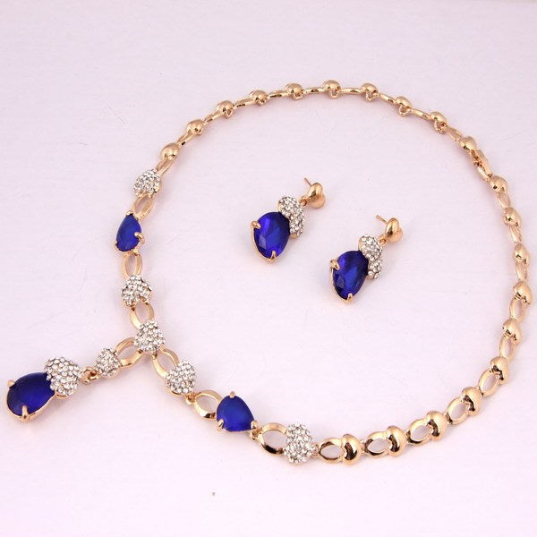 Parure Élégante Dorée avec Pierres Bleues et Strass