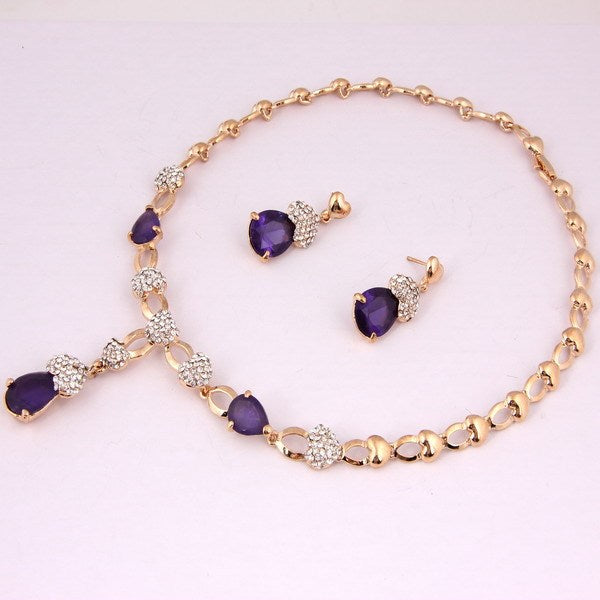 Parure Élégante Dorée avec Pierres Bleues et Strass
