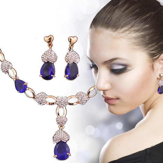 Parure Élégante Dorée avec Pierres Bleues et Strass